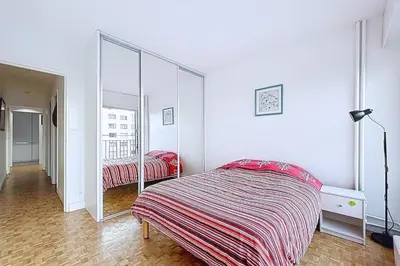 Un ou plusieurs lits dans un hébergement de l'établissement Appartement familial et lumineux proche Nation