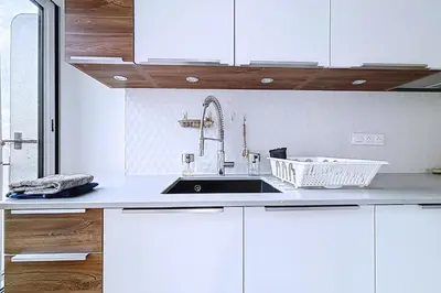 Cuisine ou kitchenette dans l'établissement Appartement familial et lumineux proche Nation