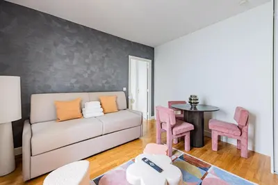 Coin salon dans l'établissement #4people#1Bedroom#ChampsElysées#AC