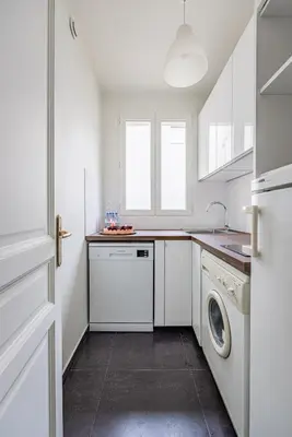 Cuisine ou kitchenette dans l'établissement #4people#1Bedroom#ChampsElysées#AC