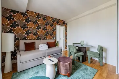 Coin salon dans l'établissement # 4people # 1Bedroom # ChampsElysées # AC