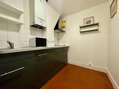 Cuisine ou kitchenette dans l'établissement Parc Montsouris Paris