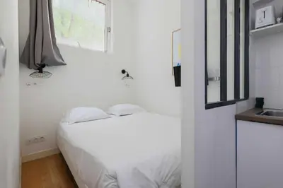 Un ou plusieurs lits dans un hébergement de l'établissement Intimate Studio - 2 Guests - Le Marais