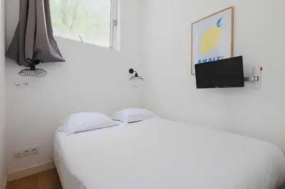 Un ou plusieurs lits dans un hébergement de l'établissement Intimate Studio - 2 Guests - Le Marais