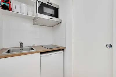 Cuisine ou kitchenette dans l'établissement Intimate Studio - 2 Guests - Le Marais