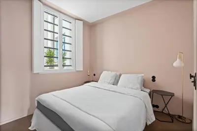 Un ou plusieurs lits dans un hébergement de l'établissement The Poly Loft