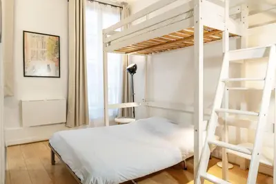 Un ou plusieurs lits dans un hébergement de l'établissement Studio au centre de Paris