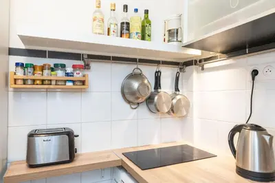 Cuisine ou kitchenette dans l'établissement Studio au centre de Paris