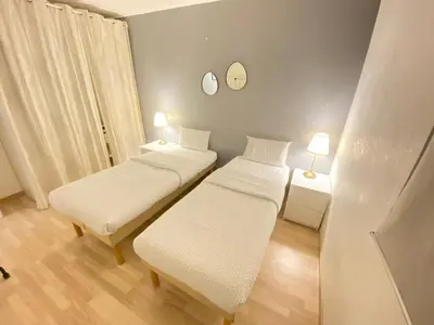 Un ou plusieurs lits dans un hébergement de l'établissement 2 Bedroom Calm La Défense