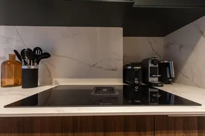 Cuisine ou kitchenette dans l'établissement Sublime appartement Arc de Triomphe