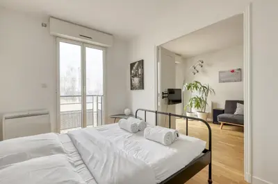 Un ou plusieurs lits dans un hébergement de l'établissement Le Feutrier - Appartement au pied de Montmartre