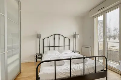 Un ou plusieurs lits dans un hébergement de l'établissement Le Feutrier - Appartement au pied de Montmartre