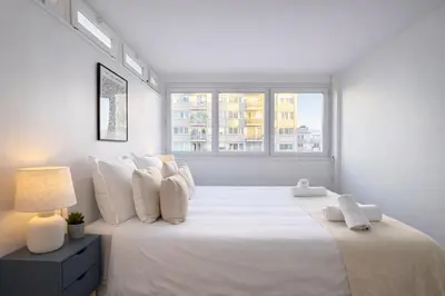 Un ou plusieurs lits dans un hébergement de l'établissement Appartement charmant près du parc Montsouris