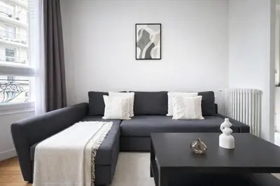 Coin salon dans l'établissement Splendide 3 pièces à Issy-les-Moulineaux