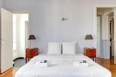 Un ou plusieurs lits dans un hébergement de l'établissement Appartement de charme au coeur de Montorgueil