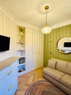 Télévision ou salle de divertissement dans l'établissement Appartement Parking Sud Paris