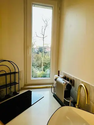 Un ou plusieurs lits dans un hébergement de l'établissement Appartement Parking Sud Paris