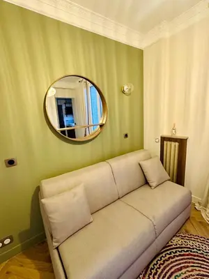 Coin salon dans l'établissement Appartement Parking Sud Paris