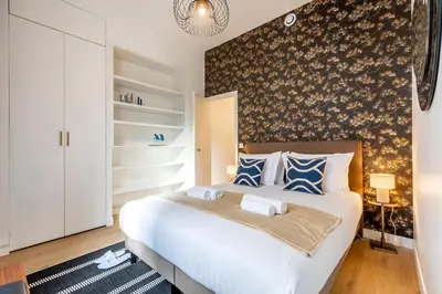 Un ou plusieurs lits dans un hébergement de l'établissement A1# 8people # 4Bedrooms # Wagram # AC # Paris 8