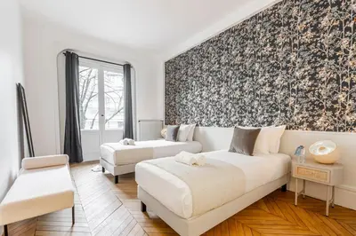 Un ou plusieurs lits dans un hébergement de l'établissement A1# 8people # 4Bedrooms # Wagram # AC # Paris 8