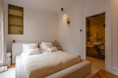 Un ou plusieurs lits dans un hébergement de l'établissement Elysee Prestige - Luxury Home near Champs Elysees