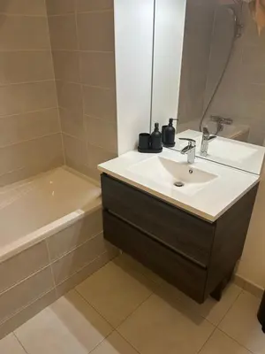 Salle de bains dans l'établissement Appartement familial Proche Paris parking privée