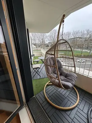 Coin salon dans l'établissement Appartement familial Proche Paris parking privée