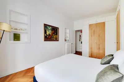 Un ou plusieurs lits dans un hébergement de l'établissement Luxury Apartment 4BR-8P-Eiffel Tower