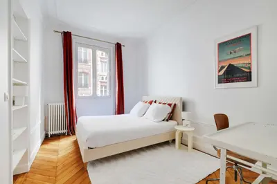Un ou plusieurs lits dans un hébergement de l'établissement Luxury Apartment 4BR-8P-Eiffel Tower