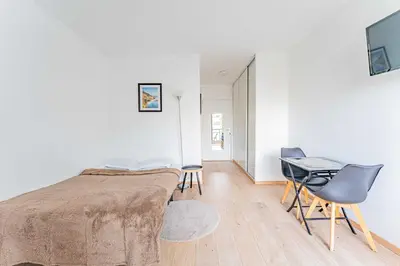 Un ou plusieurs lits dans un hébergement de l'établissement Charming Studio 2P - Courbevoie