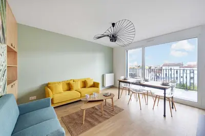 Coin salon dans l'établissement 3bdr-4P family flat on the outskirts of Paris