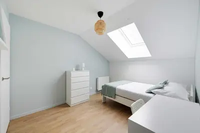 Un ou plusieurs lits dans un hébergement de l'établissement 3bdr-4P family flat on the outskirts of Paris