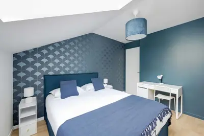 Un ou plusieurs lits dans un hébergement de l'établissement 3bdr-4P family flat on the outskirts of Paris