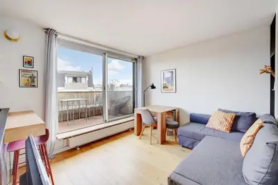 Coin salon dans l'établissement Elegant Apartment - 1BR- 2P- Nation