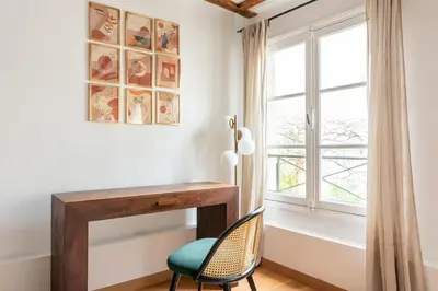 Un ou plusieurs lits dans un hébergement de l'établissement Charming air-conditioned apartment - Saint Germain