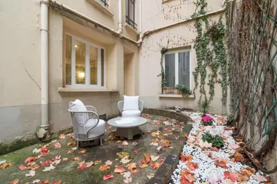 Jardin de l'établissement Modern studio in the heart of Paris near Eiffel Tower