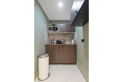Cuisine ou kitchenette dans l'établissement Modern studio in the heart of Paris near Eiffel Tower