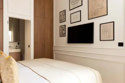 Télévision ou salle de divertissement dans l'établissement Amazing apartment 2BR 6P - Louvre Museum