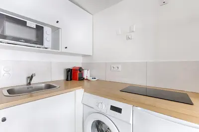Cuisine ou kitchenette dans l'établissement Studio de charme au coeur du Sentier I