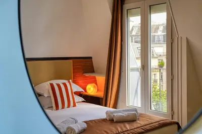 Un ou plusieurs lits dans un hébergement de l'établissement A5#Premium#ArcDeTriomphe#4Bedrooms#ChampsÉlysées