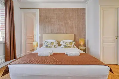 Un ou plusieurs lits dans un hébergement de l'établissement A5#Premium#ArcDeTriomphe#4Bedrooms#ChampsÉlysées