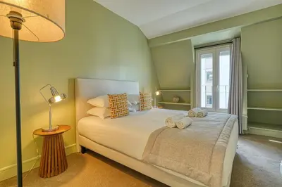 Un ou plusieurs lits dans un hébergement de l'établissement A5#Premium#ArcDeTriomphe#4Bedrooms#ChampsÉlysées