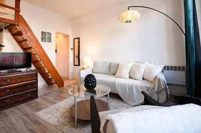 Un ou plusieurs lits dans un hébergement de l'établissement Cozy Parisian Studio Montorgueil