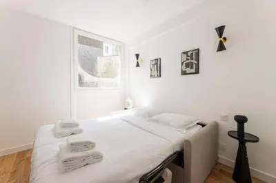Un ou plusieurs lits dans un hébergement de l'établissement Elegant studio in Avenue Kléber, Paris 16th