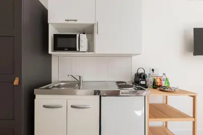 Cuisine ou kitchenette dans l'établissement Elegant studio in Avenue Kléber, Paris 16th