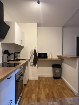 Cuisine ou kitchenette dans l'établissement Large apartment for 10 people Saint Fargeau