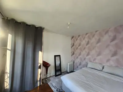 Un ou plusieurs lits dans un hébergement de l'établissement Quiet Cosy Apartment near Montmartre - Paris