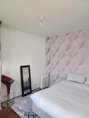 Un ou plusieurs lits dans un hébergement de l'établissement Quiet Cosy Apartment near Montmartre - Paris