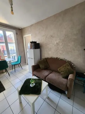 Coin salon dans l'établissement Quiet Cosy Apartment near Montmartre - Paris