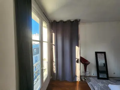 Un ou plusieurs lits dans un hébergement de l'établissement Quiet Cosy Apartment near Montmartre - Paris
